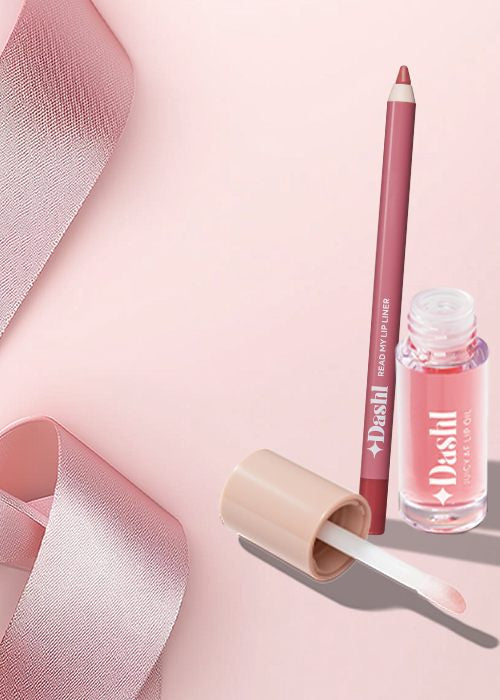 Lip makeup set with lip liner and gloss on a pink background